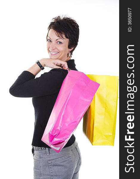 Woman with shopping bags over white background. Woman with shopping bags over white background