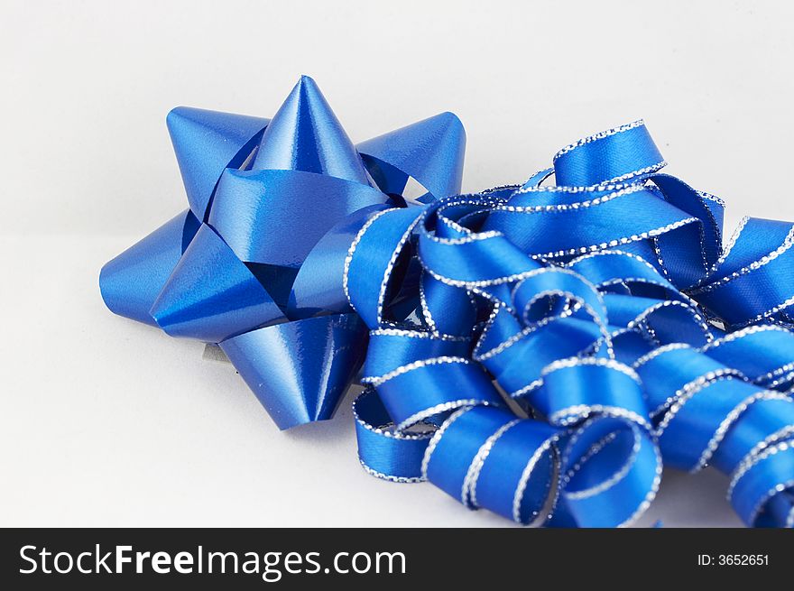 Christmas scene with blue ribbon and bow. Christmas scene with blue ribbon and bow