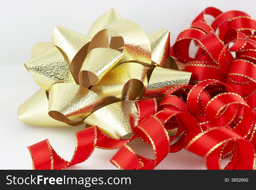 Red and gold christmas ribbon and bow scene