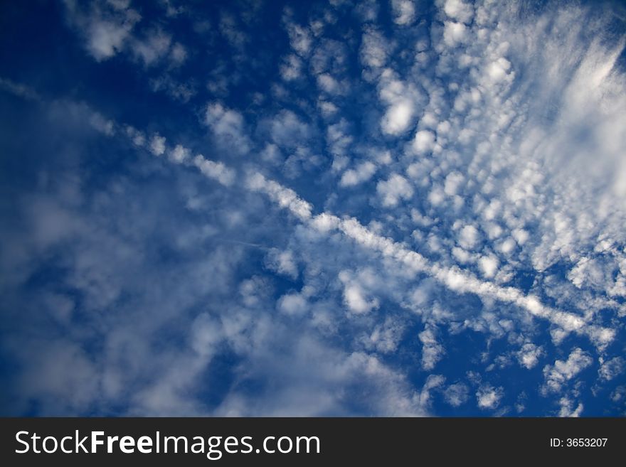 View of nice deep blue sky with white clouds.