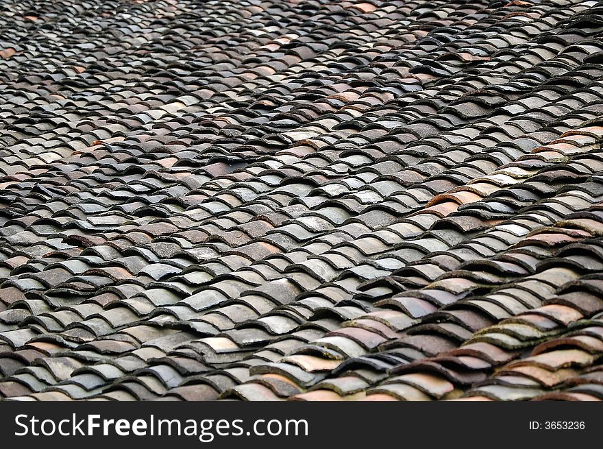 Abstract roof tile pattern, shot at an old village near Guilin, China. Abstract roof tile pattern, shot at an old village near Guilin, China.