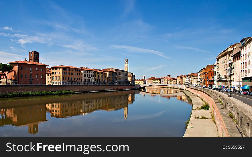 Pisa, Tuscany, Italy. A view of the historical buildings on Arno river. Pisa, Tuscany, Italy. A view of the historical buildings on Arno river.
