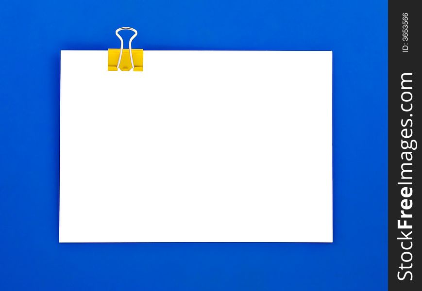 Blank note clipped on blue clipboard. Blank note clipped on blue clipboard