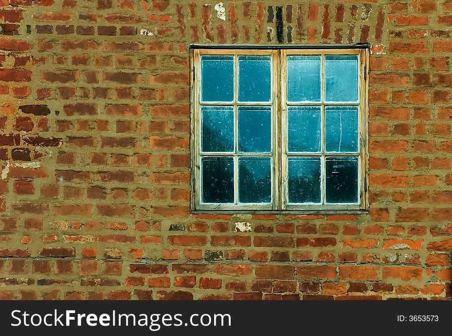 Window on a red brick wall. Window on a red brick wall