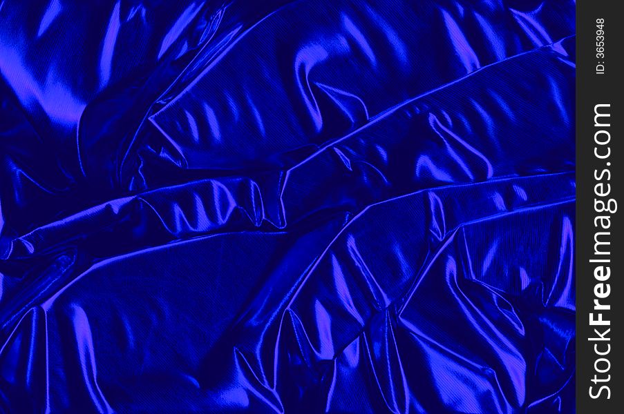 Exclusive shiny blue decoration fabric as a background for your products and/or text.