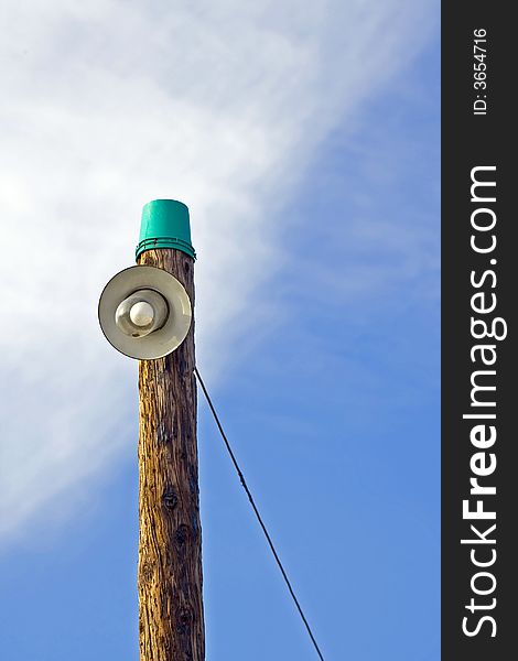 Electrical wooden column with lamp