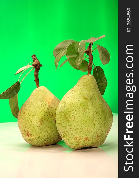 Pear on a green background