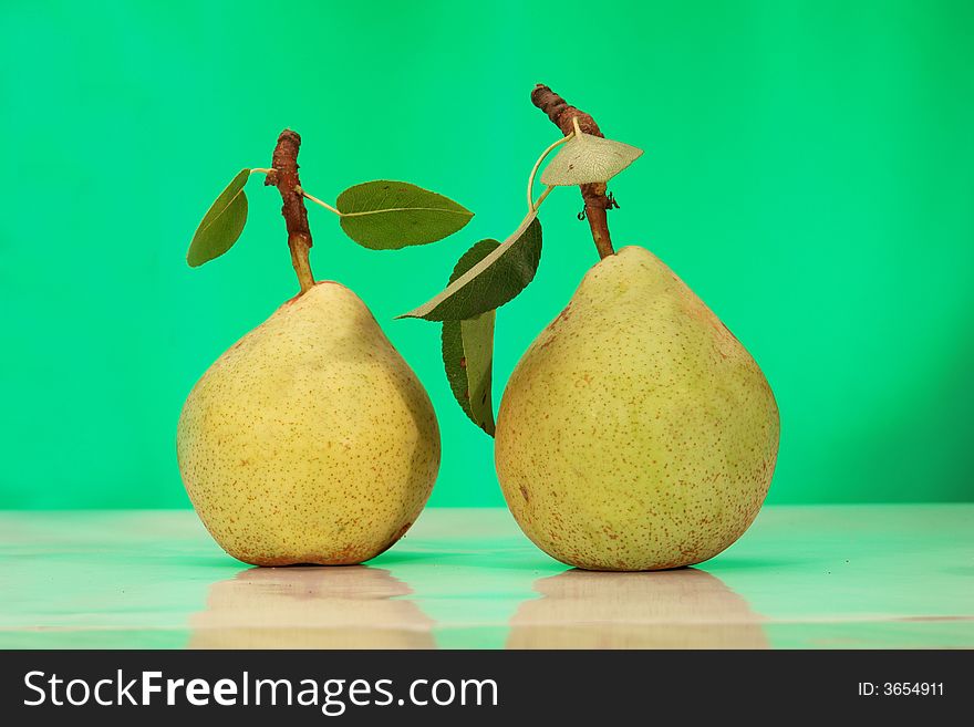Pear on a green background
