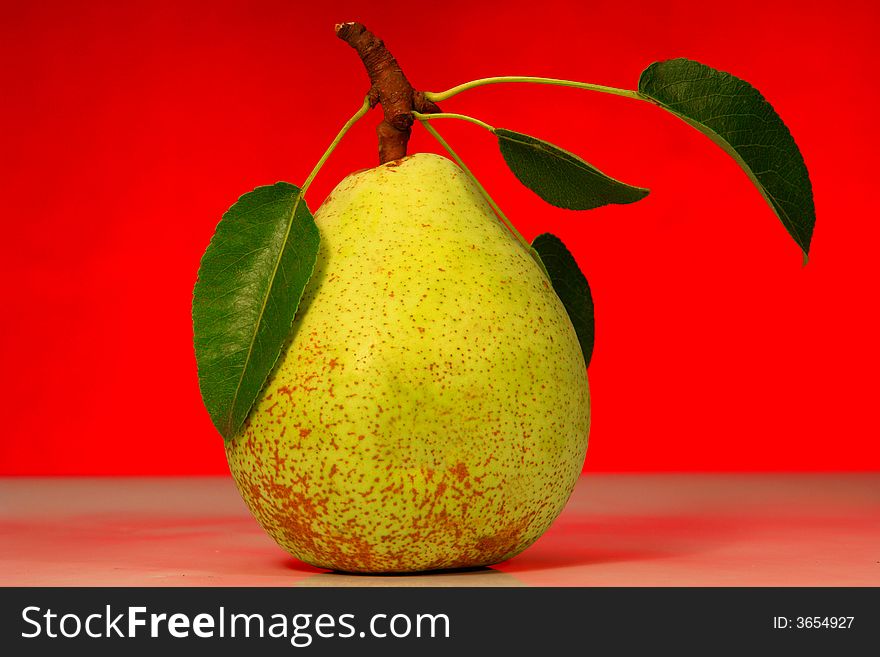Pear on a red background
