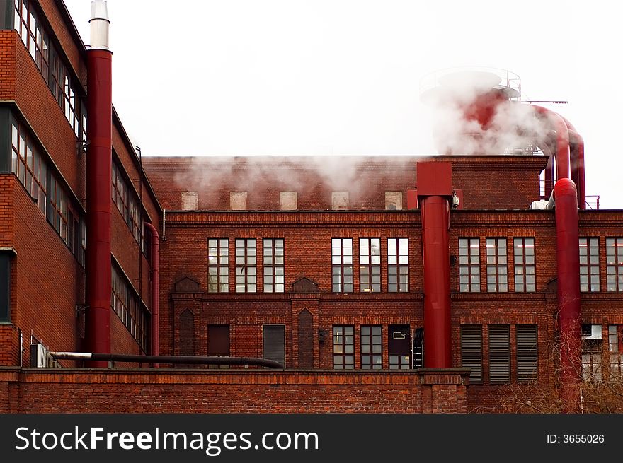 Big factory made of red bricks