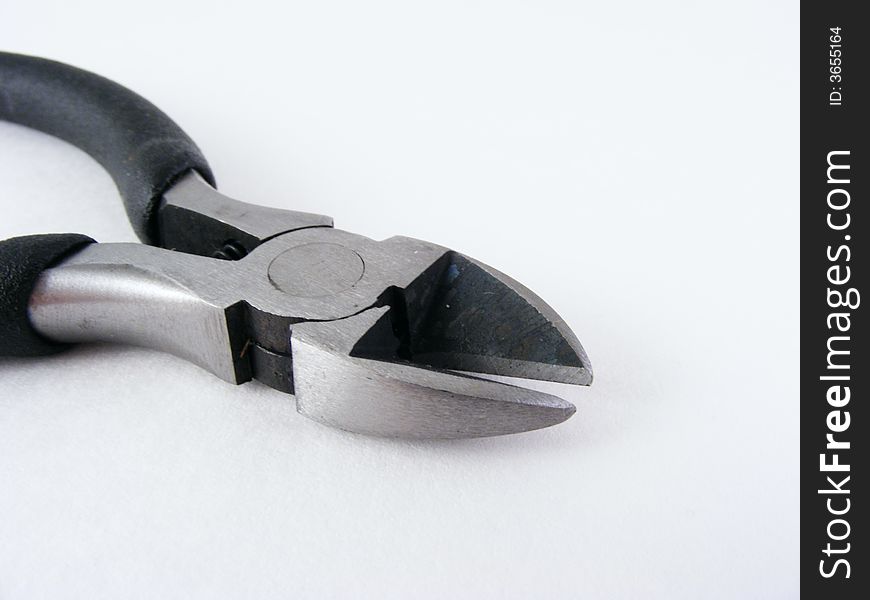 A photo of a wire cutting tool. A photo of a wire cutting tool.