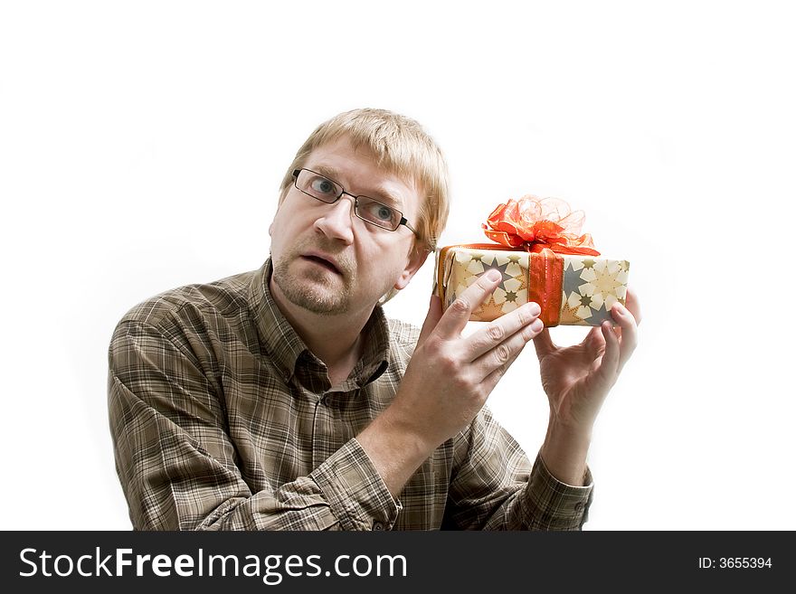 A man with Christmas gifts in hands