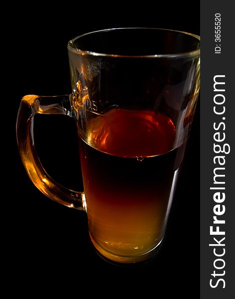 Cup of tea on black background