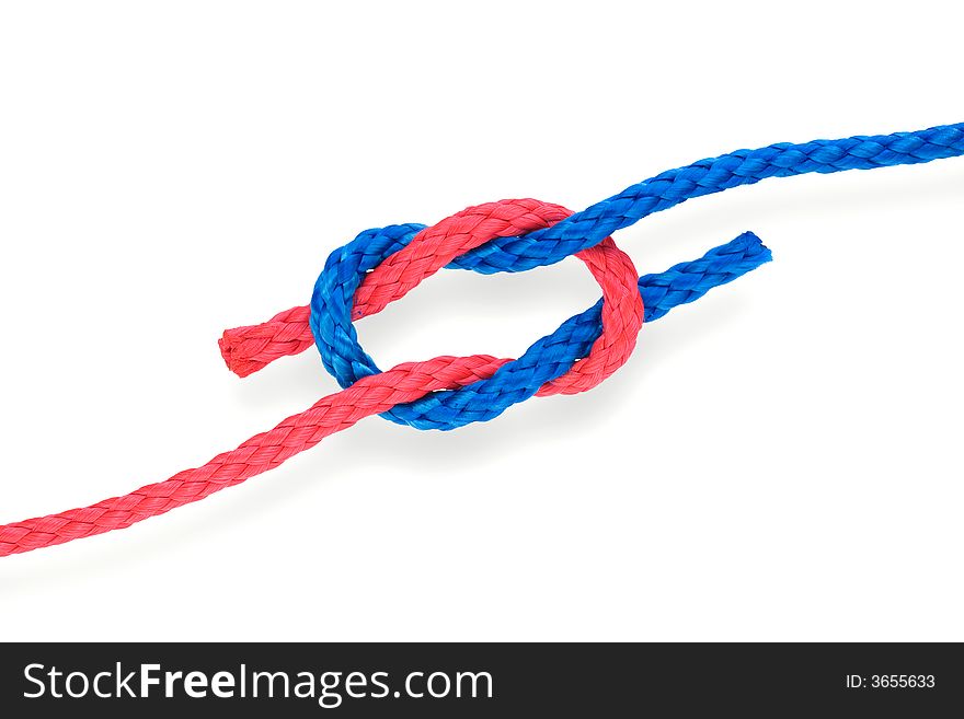 Fisher's bad reef knot with red and blue ropes. Isolated on white. Fisher's bad reef knot with red and blue ropes. Isolated on white.