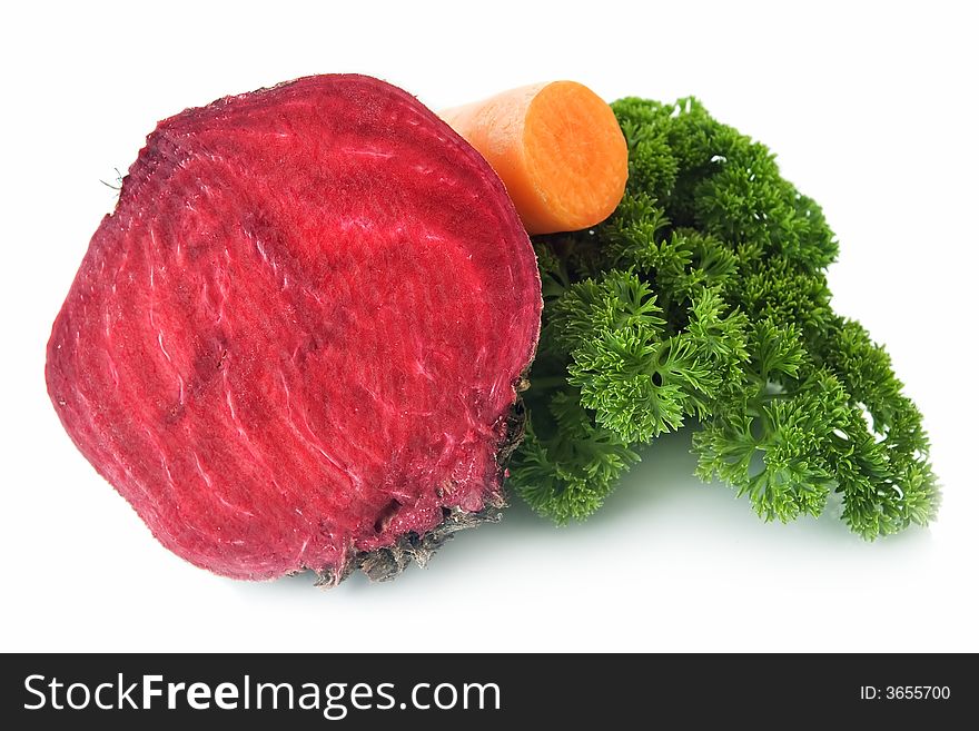 Red beet, carrot and parsley isolated on white background.