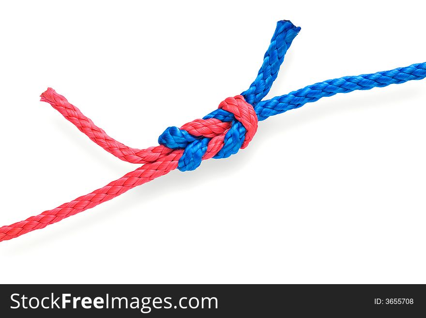 Fisher's academic knot with red and blue ropes. Isolated on white. Tight. Fisher's academic knot with red and blue ropes. Isolated on white. Tight.