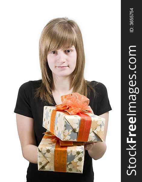 A teen girl with Christmas gifts in hands. A teen girl with Christmas gifts in hands