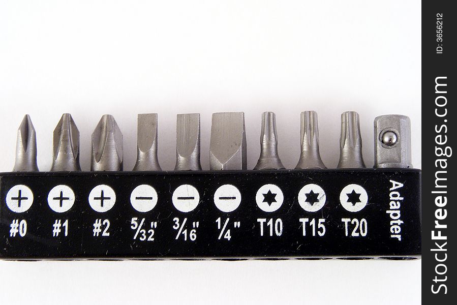 Interchangeable screwdriver bits against a white background.