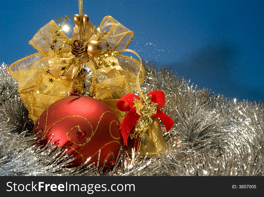 Shiny christmas card with red globe and golden ribbon. Shiny christmas card with red globe and golden ribbon