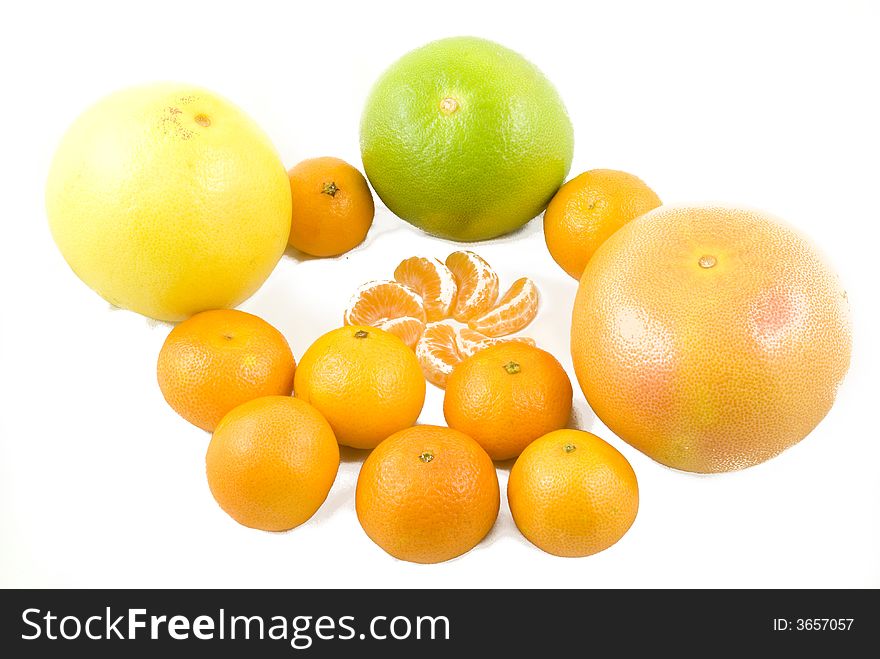 Fresh grapefruits and peeled tangerines