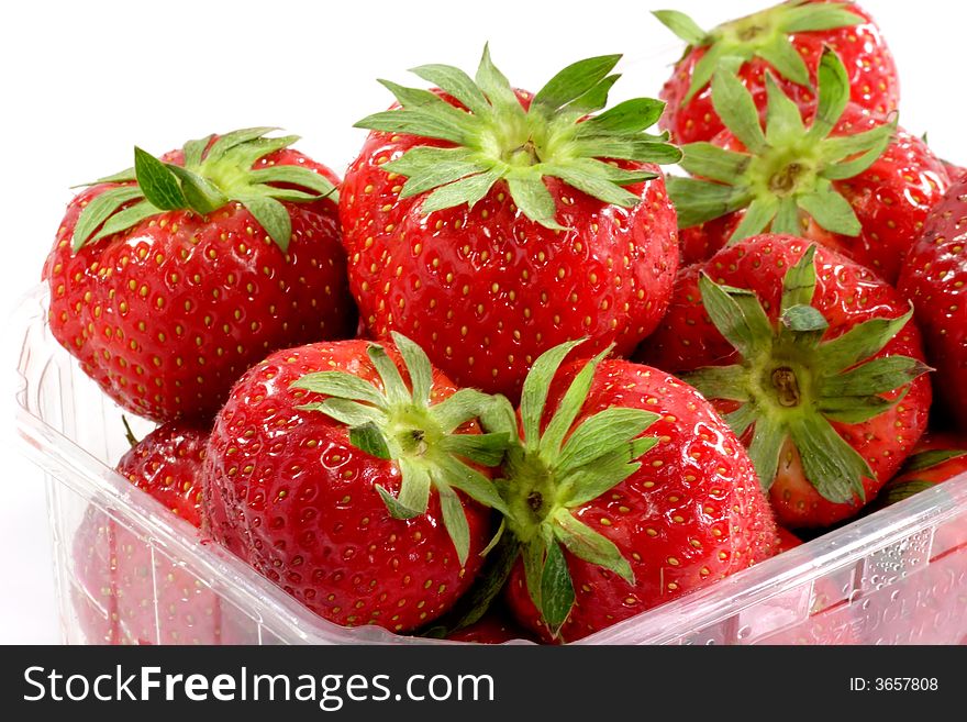 Box of fresh strawberries on white Background