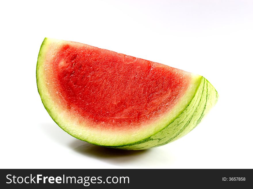 Slice of fresh watermelon on white background