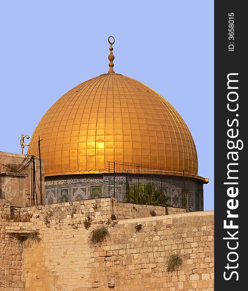 The golden Dom on the temple ground in Jerusalem, in foreground the wailing, western wall. The golden Dom on the temple ground in Jerusalem, in foreground the wailing, western wall.