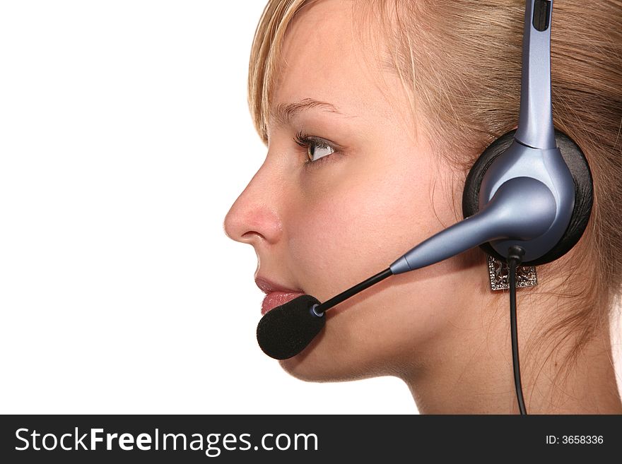 Profile of young woman in headset