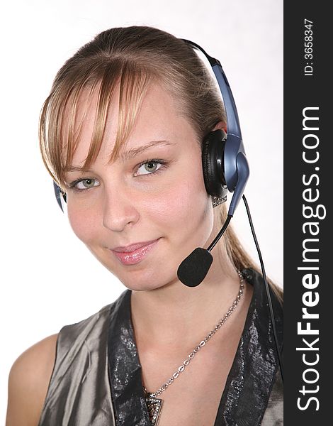 Young woman in headset on a white