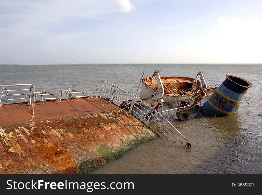 Rusted Shipwreck In The Coast