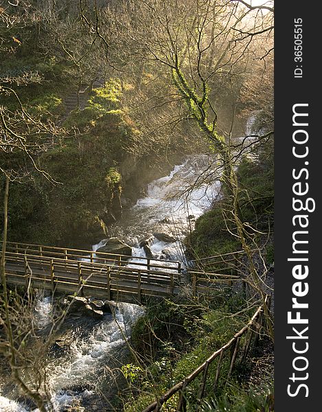 Bridge over the river in winter, Lyn valley, Devon, England. Bridge over the river in winter, Lyn valley, Devon, England.