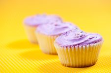 Muffin With Vanilla Filling Against Yellow Background Royalty Free Stock Photos Muffin With Vanilla Filling Against Yellow Background Royalty Free Stock Photos