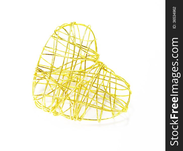 Heart shape golden wire on white. Heart shape golden wire on white