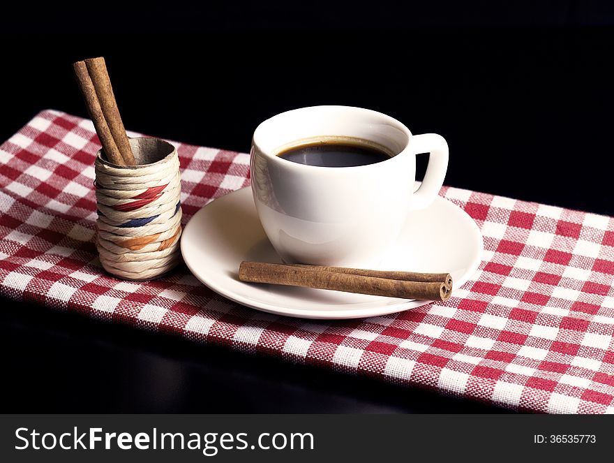 White coffee cup with cinnamon