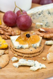 Crackers With Blue Cheese And Apple Jam, Nuts And Grapes Stock Photos Crackers With Blue Cheese And Apple Jam, Nuts And Grapes Stock Photos