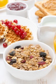 Muesli Waffles With Berries, Jams, Milk For Breakfast Stock Photography Muesli Waffles With Berries, Jams, Milk For Breakfast Stock Photography