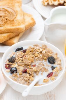 Muesli With Milk, Toast With Peanut Butter For Breakfast Royalty Free Stock Photos