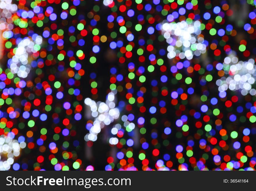 Christmas tree with multicolor blurry lights