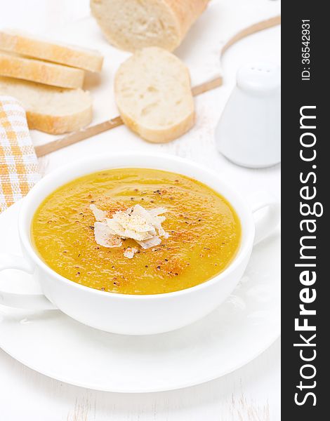 Cream soup of yellow lentils with vegetables, vertical