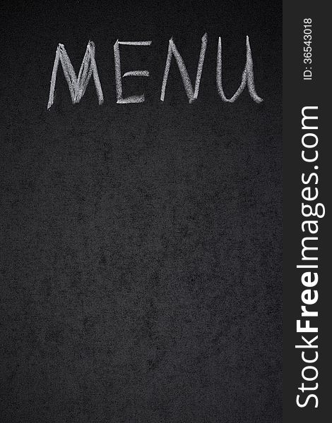 Menu title is written white chalk on a blackboard, vertical