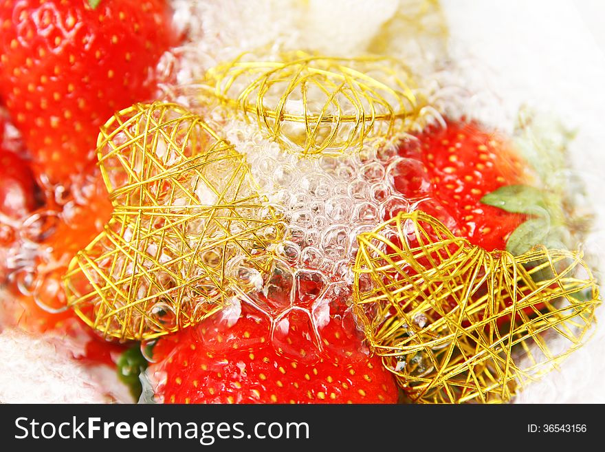 Fresh strawberries with water bubbles on white. Fresh strawberries with water bubbles on white