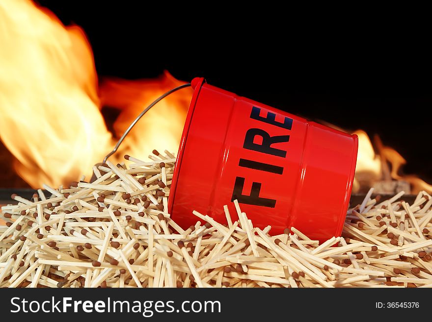 Fire bucket with sign Fire, Flames and matchstick. Fire bucket with sign Fire, Flames and matchstick