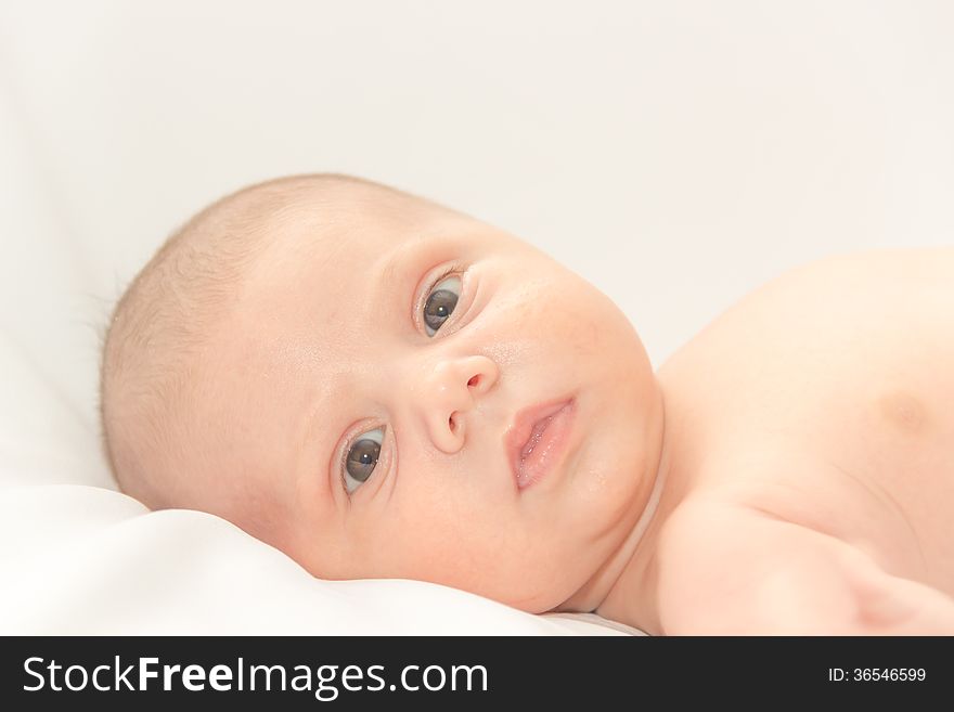 Photographed on a white baby before a dip. Photographed on a white baby before a dip