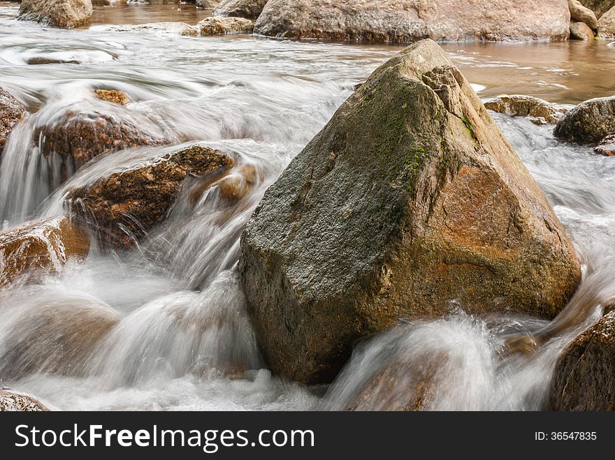 Beautiful river flow over the stone. Beautiful river flow over the stone