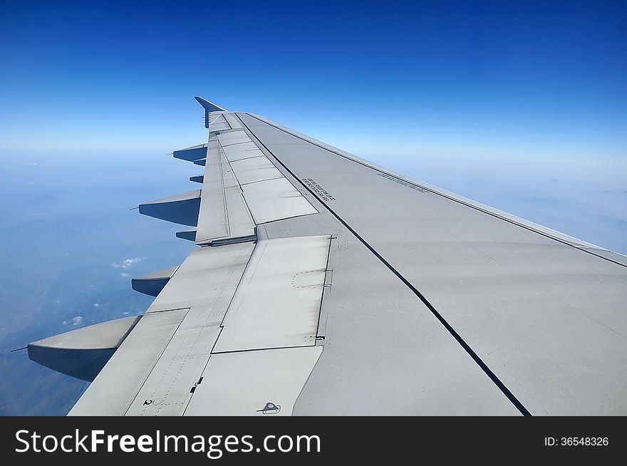 Airplane wing and Blue sky
