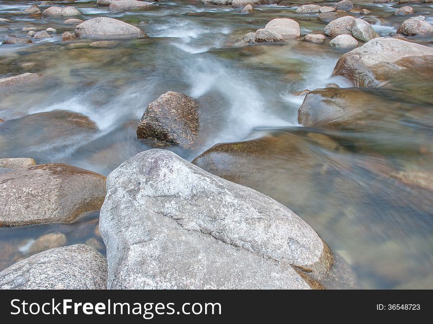 Beautiful river flow over the stone. Beautiful river flow over the stone