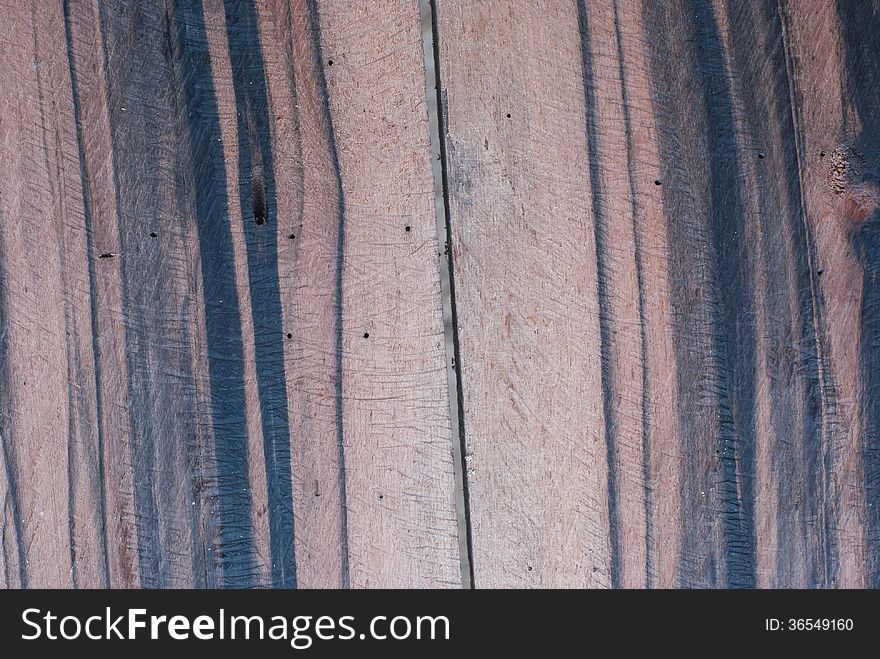 Photo of an old wood plank taken from a rotting barn. Photo of an old wood plank taken from a rotting barn.