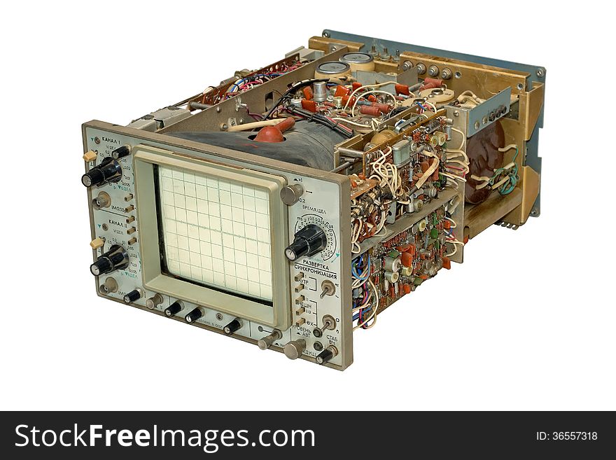 Old oscilloscope in parts, isolated on a white background. Old oscilloscope in parts, isolated on a white background.