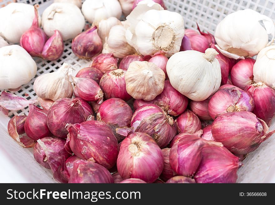 Onion and garlic background view. Onion and garlic background view