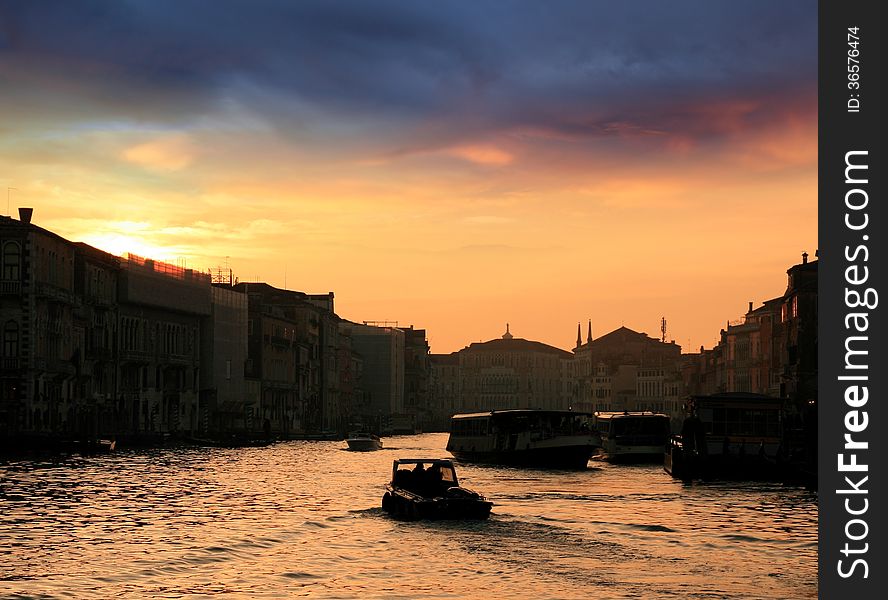 Sunset of the Grand Canal viewed from the Rialto bridge in Venice. Sunset of the Grand Canal viewed from the Rialto bridge in Venice